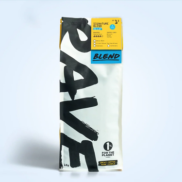 1kg Coffee bag labeled 'Signature Blend Decaf' with Rave branding and text on a Ice blue background