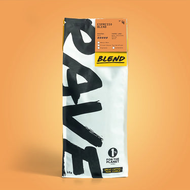 1kg Coffee bag labeled 'Espresso Blen' with Rave branding and text on a peach background