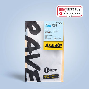 250g Coffee bag labeled 'Swiss Water Decaf Blend' with Rave branding and text on a light blue background. Independent 2026/ best buy stamp