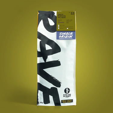 1kg Coffee bag labeled 'India Monsoon Malabar' with Rave branding and text on a green background