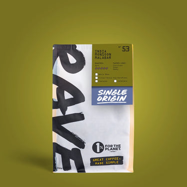 250g Coffee bag labeled 'India Monsoon Malabar' with Rave branding and text on a green background