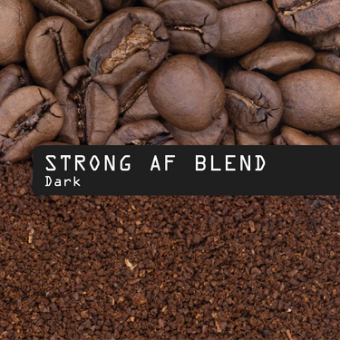 Coffee photograph showing whole roasted coffee beans at the top, roasted coffee grounds at the bottom, and a black label across the center reading “STRONG AF BLEND” and “Dark.”.