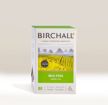 A box of Birchall Mao Feng Green Tea, 80 count, featuring a white and green packaging design with an illustration of a tea field and mountains.